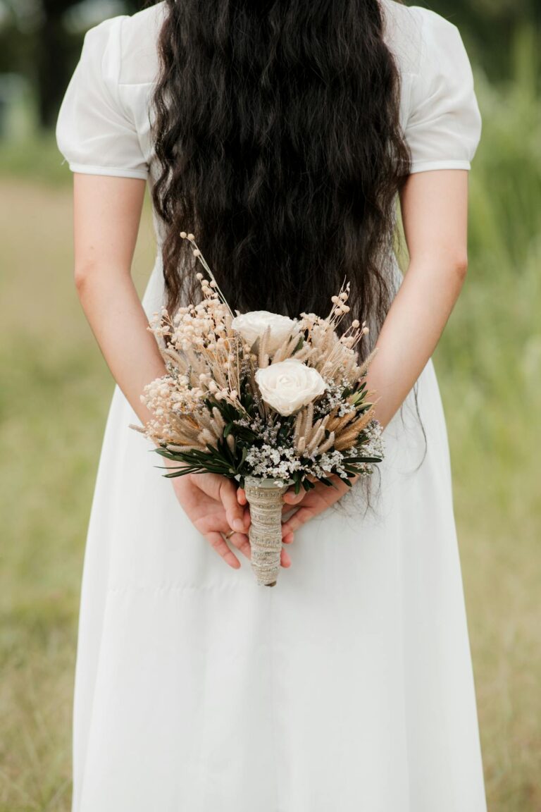 Bride Holding Bouquet in Outdoor Engagement Scene